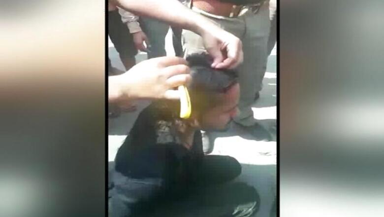 Policemen Suspended for Inaction Over Youth's Tonsuring