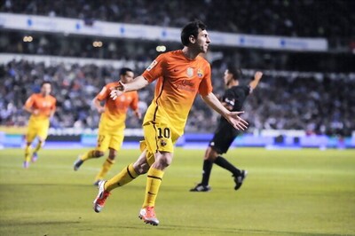 Messi hat-trick leads Barca to 5-4 win at Deportivo