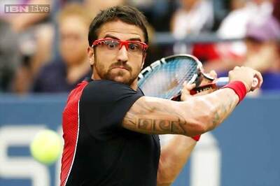 Tipsarevic upset in 1st round at St. Petersburg