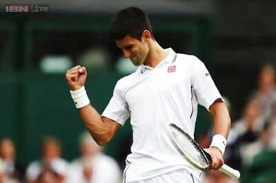 Novak Djokovic eases past Tsonga to reach Wimbledon quarters