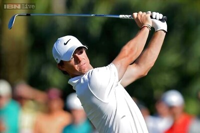 McIlroy mounts late birdie surge in Abu Dhabi opener