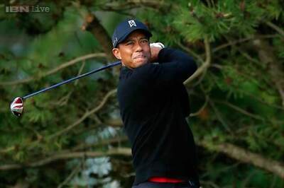Chalmers sets pace at Congressional, Woods toils