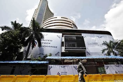 Sensex ends 61 points down, Tata Motors	big loser