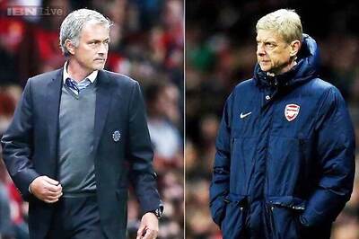 Mourinho plays down his supremacy over Wenger