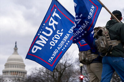 The Latest: Trump Pressures Pence To Overturn Biden's Win