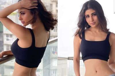 Mouni Roy Blends Chic And Class In Black Strappy Top, High-Waist Jeans