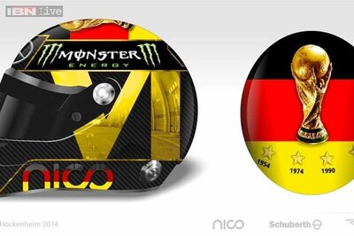 Nico Rosberg changes World Cup helmet on FIFA complaint