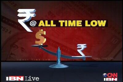 Rupee continues downward slide, hits 56.38 per $