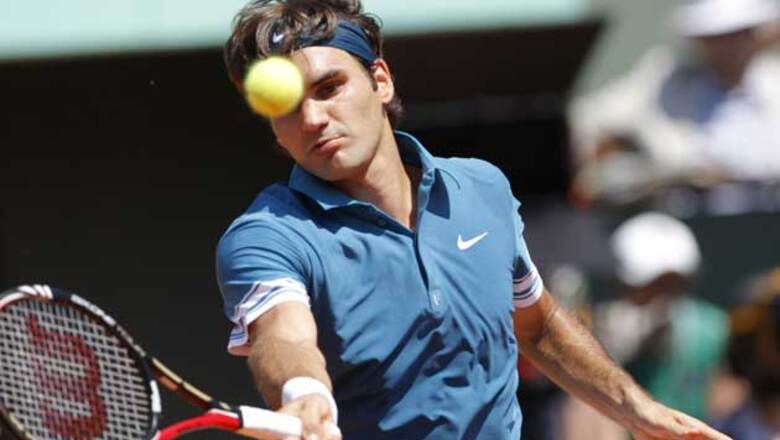 Venus Williams, Federer advance at French Open