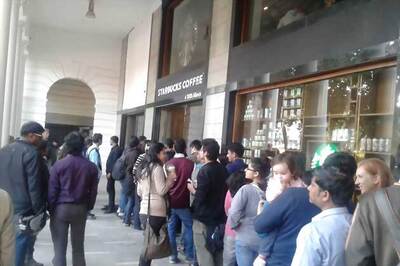 Long queues, but smiles welcome Starbucks to the heart of Delhi