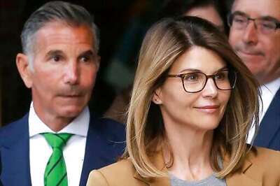 Loughlin, Giannulli remain silent as they await prison fate