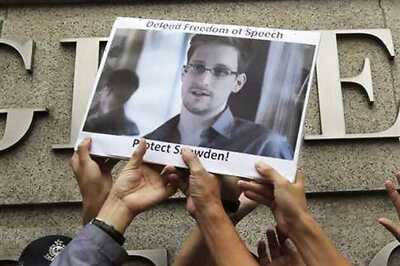 Snowden downloaded NSA secrets while working for Dell: Sources