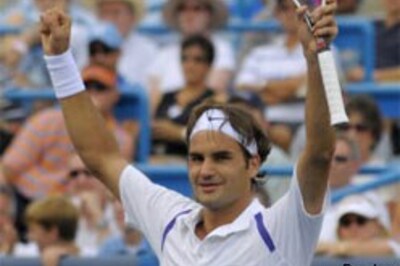 Federer demolishes Blake for his 50th title