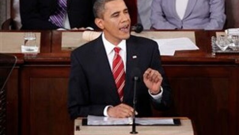 Embattled Obama says job creation top priority