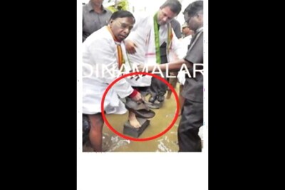 Congress veteran holds slippers for Rahul Gandhi during his visit to flood-hit Puducherry