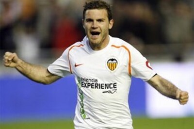 Two penalties edge Valencia past 10-man Sevilla