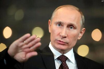 Vladimir Putin defends Russia's right to sell arms