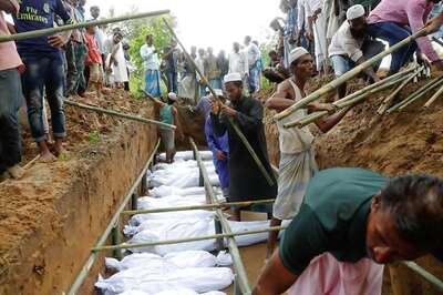 One Grave for 10 Rohingya: How Myanmar Forces Ravaged a Remote Village
