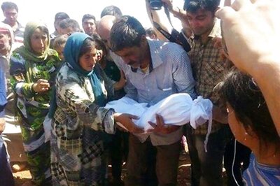 Drowned refugee boys buried in Syria; crackdown crumbles in Hungary