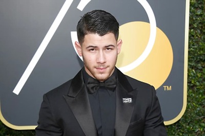 Nick Jonas 'Pumped' Up About Posing For Cigar Magazine