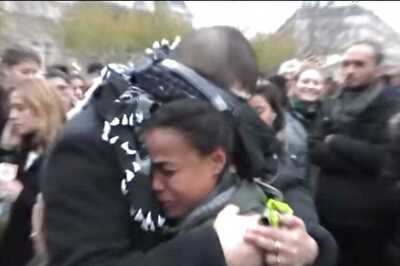 Parisians come out in large numbers to hug blindfolded Muslim man after he says 'I trust you, do you trust me?'