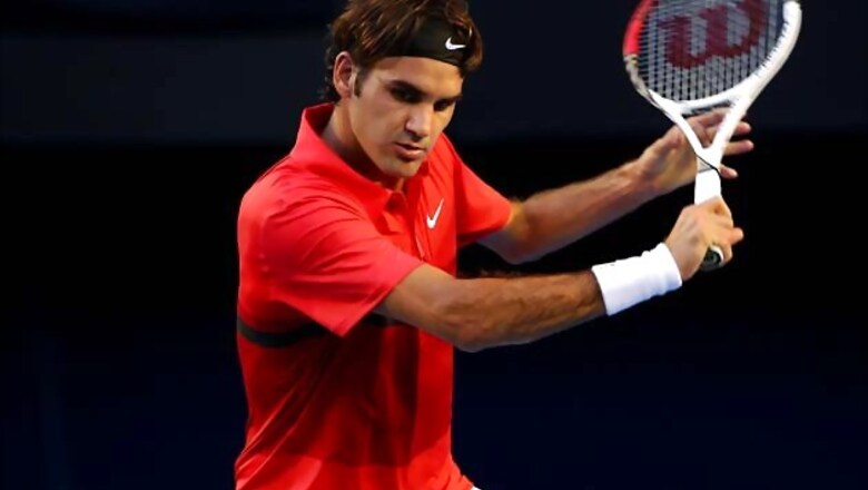 Federer crushes Tomic to enter Aus Open quarters