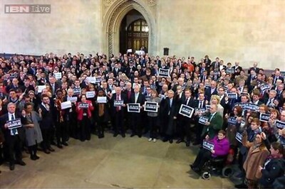 World defends freedom of expression, rallies held with people holding pens in hand