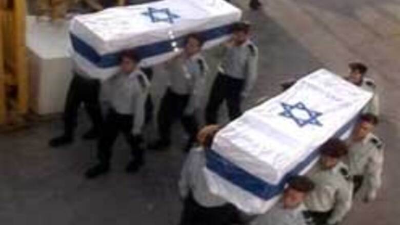 Hezbollah returns remains of Israelis killed in 2006