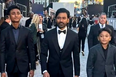 Dhanush Rocks A Mullet On The Gray Man Premiere Red Carpet But It's His Sons Who Steal The Show