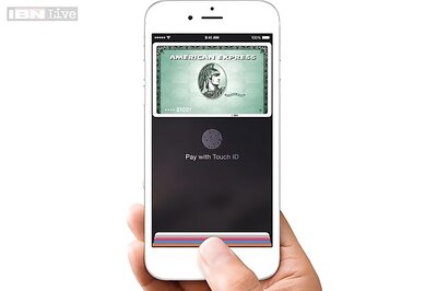 Apple's new mobile payment service Pay allows users to pay for items in stores with their iPhones