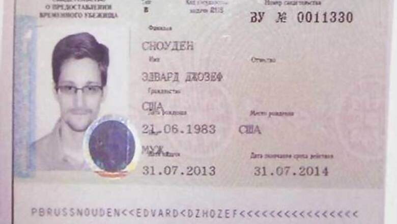 Snowden downloaded NSA secrets while working for Dell, say sources