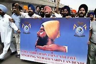 Sikh boy's hair cut in Haryana