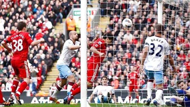 Suarez strike saves point for Liverpool