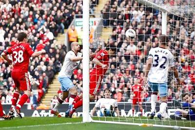 Suarez strike saves point for Liverpool