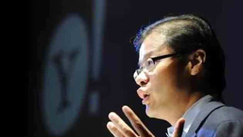 Yahoo co-founder Yang resigns; shares jump