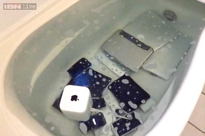 Woman dumps her boyfriend's apple products in bathtub for cheating on her