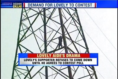 Supporter of Arvinder Singh Lovely climbs transmission tower in Delhi