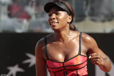 Italian Open: Williams sisters reach QF