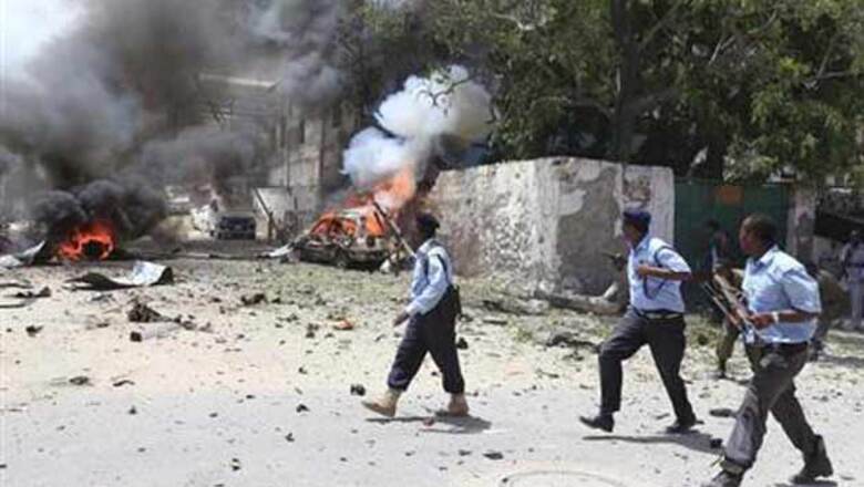 Bombs and gun battles kill at least 19 in Somali capital