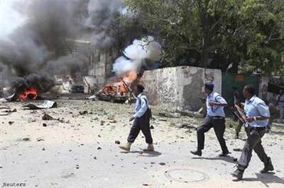 Bombs and gun battles kill at least 19 in Somali capital