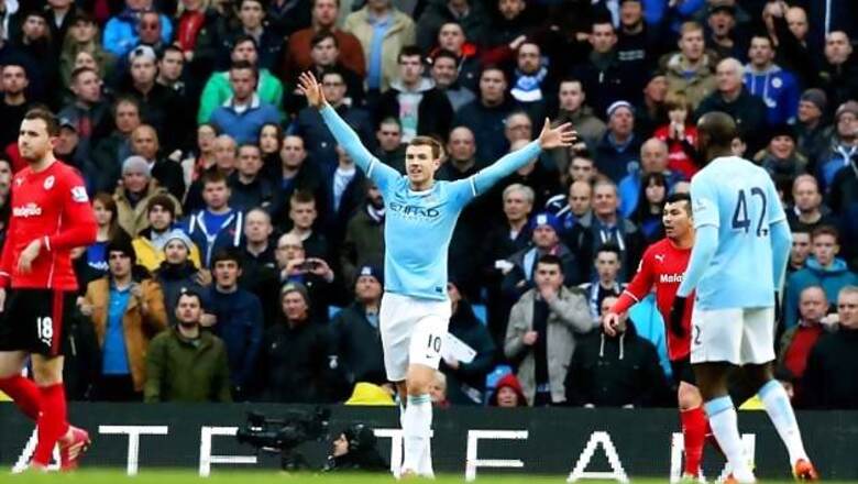 Manchester City beat Cardiff 4-2 to pass 100-goal mark