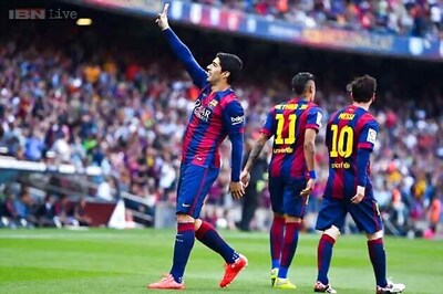 Lionel Messi, Luis Suarez score as Barcelona beat Valencia 2-0