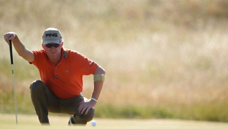 Jimenez leads, Tiger lurks in Muirfield dogfight