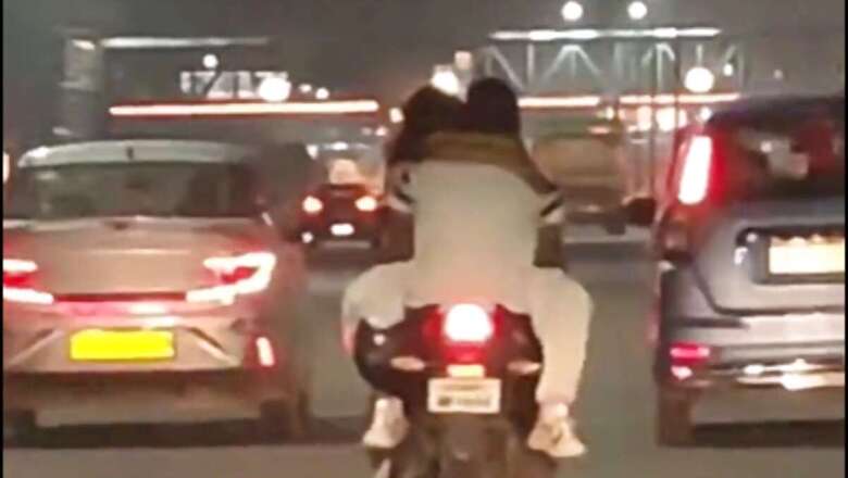 Couple Caught Romancing On Moving Bike In Ghaziabad, Police Responds