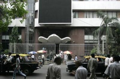Markets bounce back, Sensex opens above 9,500