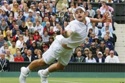 Roddick, Henin through to Round III