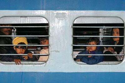 Indian passengers of Samjhauta Express cross Wagah border on foot