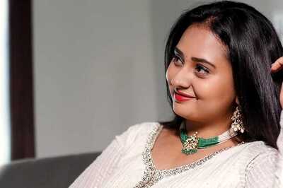 Watch: Actress Amulya Slays Traditional Look In Bright Red Frock Suit