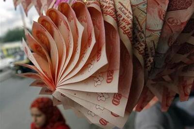 Rupee falls below 63 to over two-month low