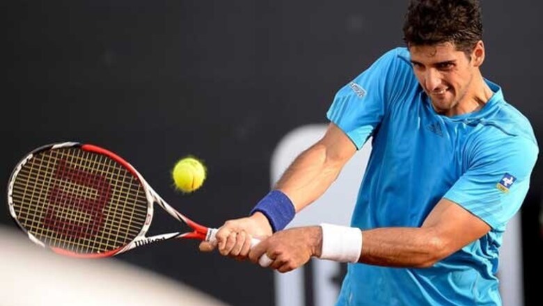 Two-time champ Thomaz Bellucci wins 1st match at Swiss Open